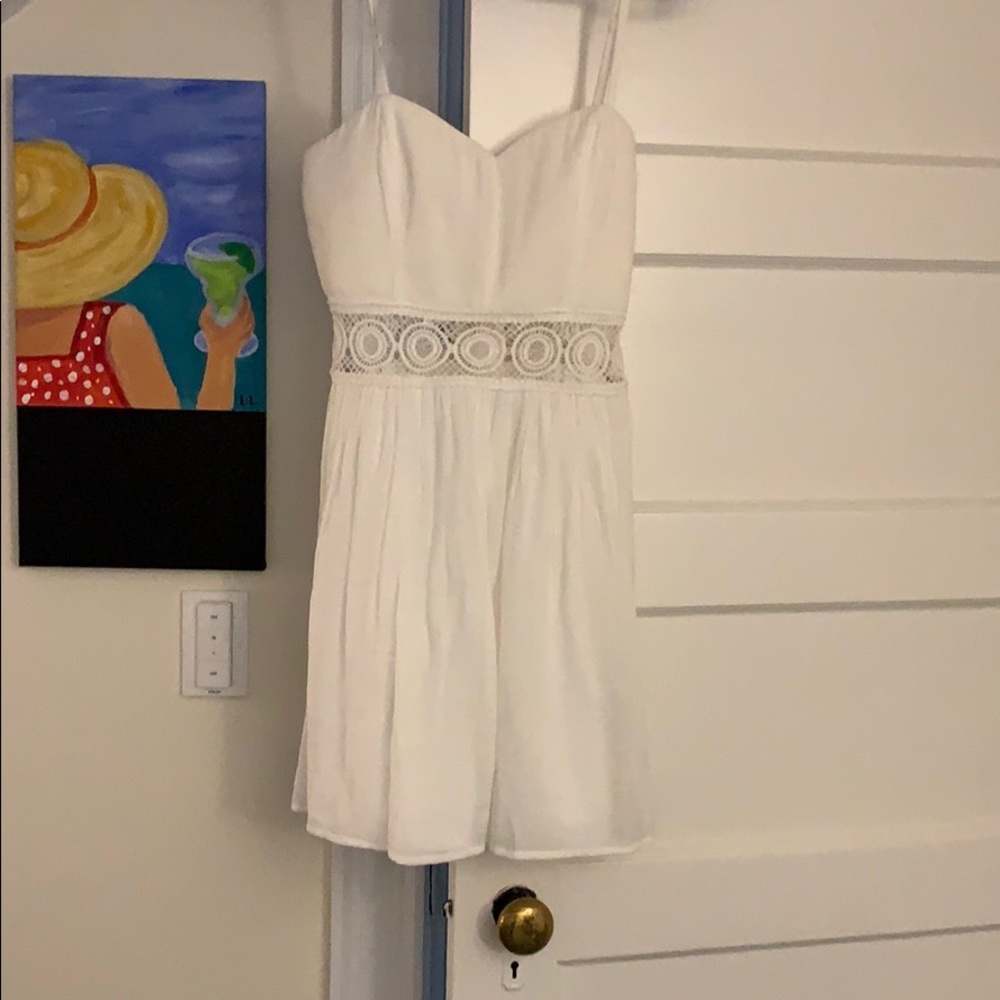 White mini dress w lace strip across mid section